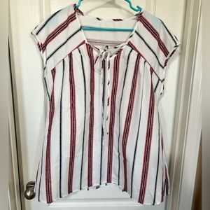 Women’s shirt size XL.